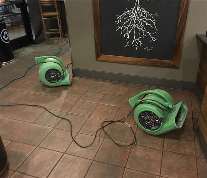 air movers drying a commercial water damage