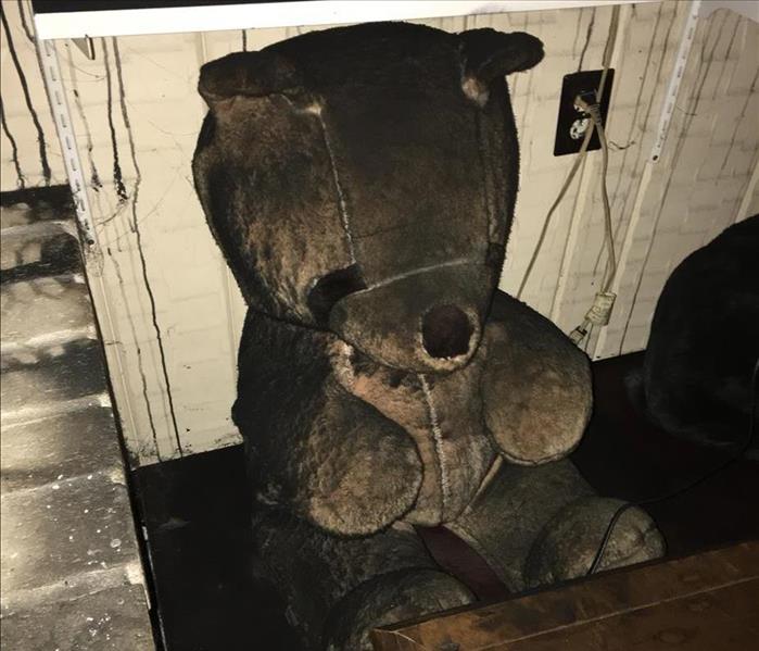 soot damaged teddy bear